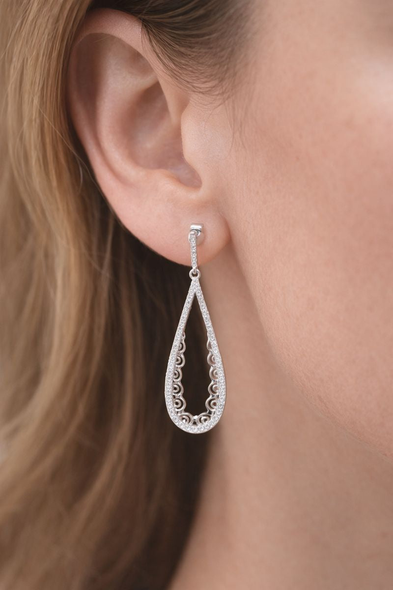 Silver Teardrop Glow Earrings